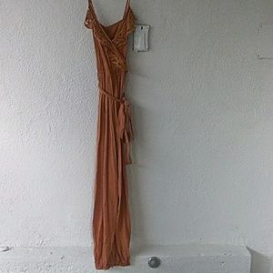 Tan romper with gold emdroidery